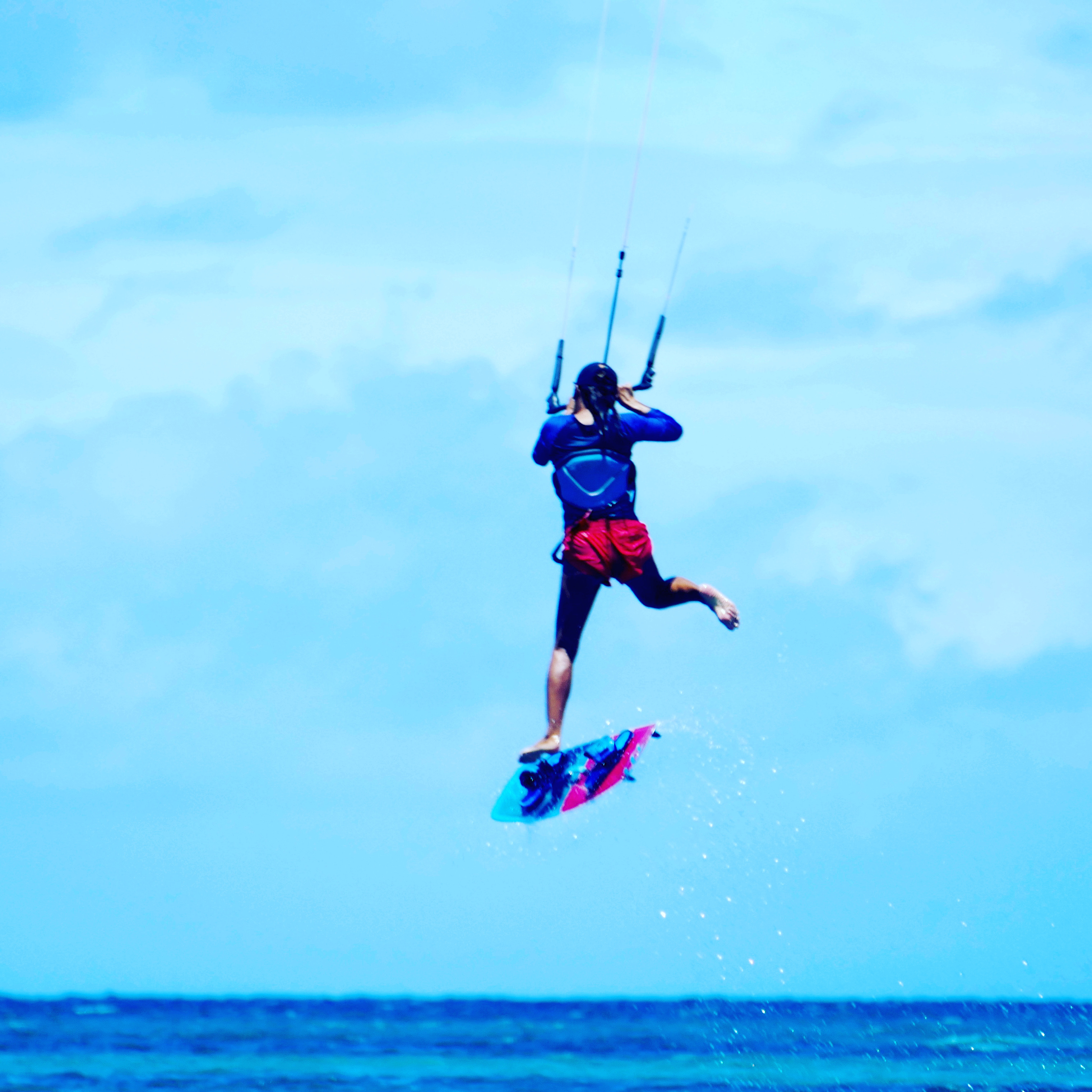 Yuka airborne over the water in Barbuda
