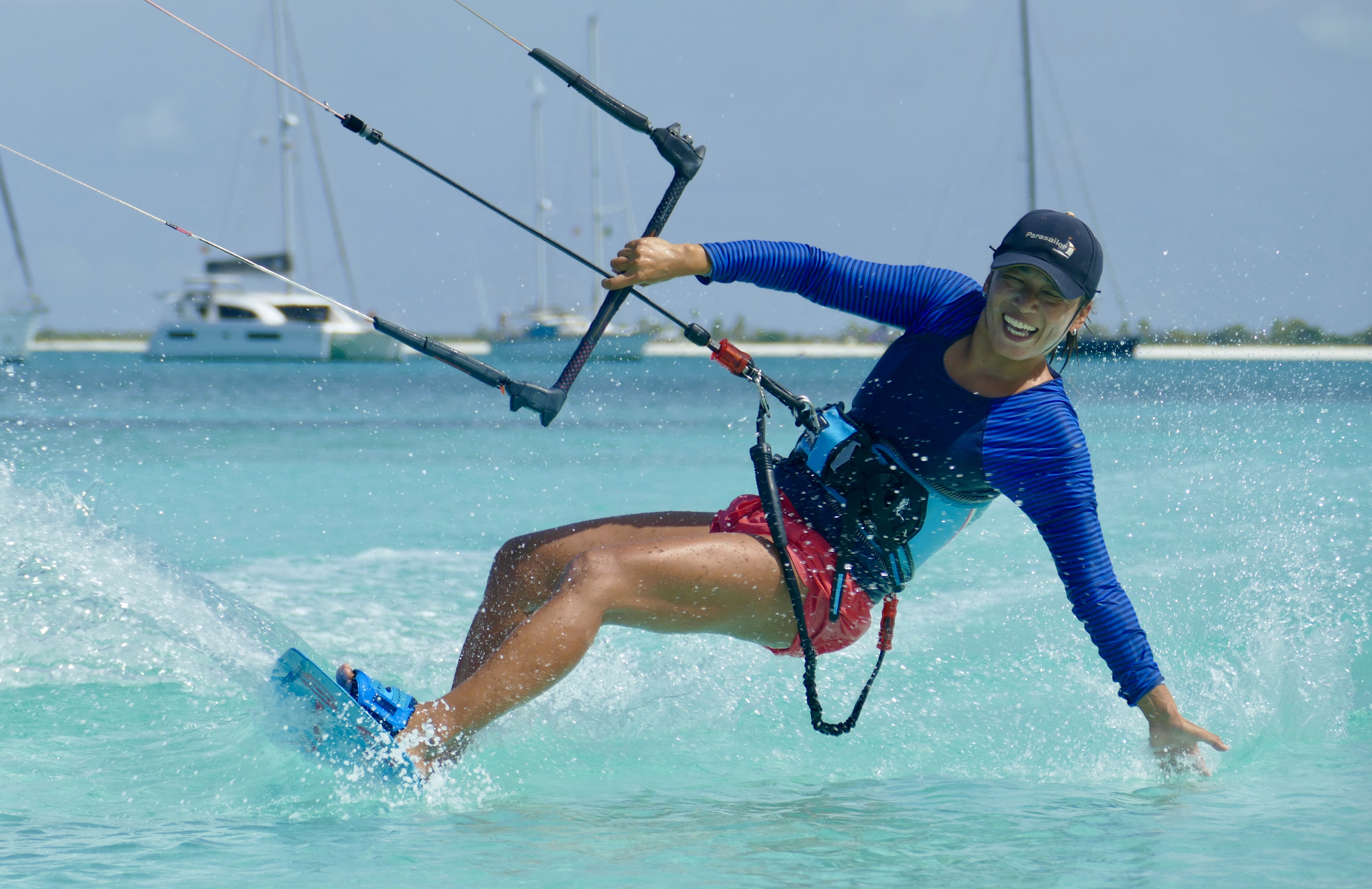 Yuka soaring over the Barbuda anchorage — sailboats below