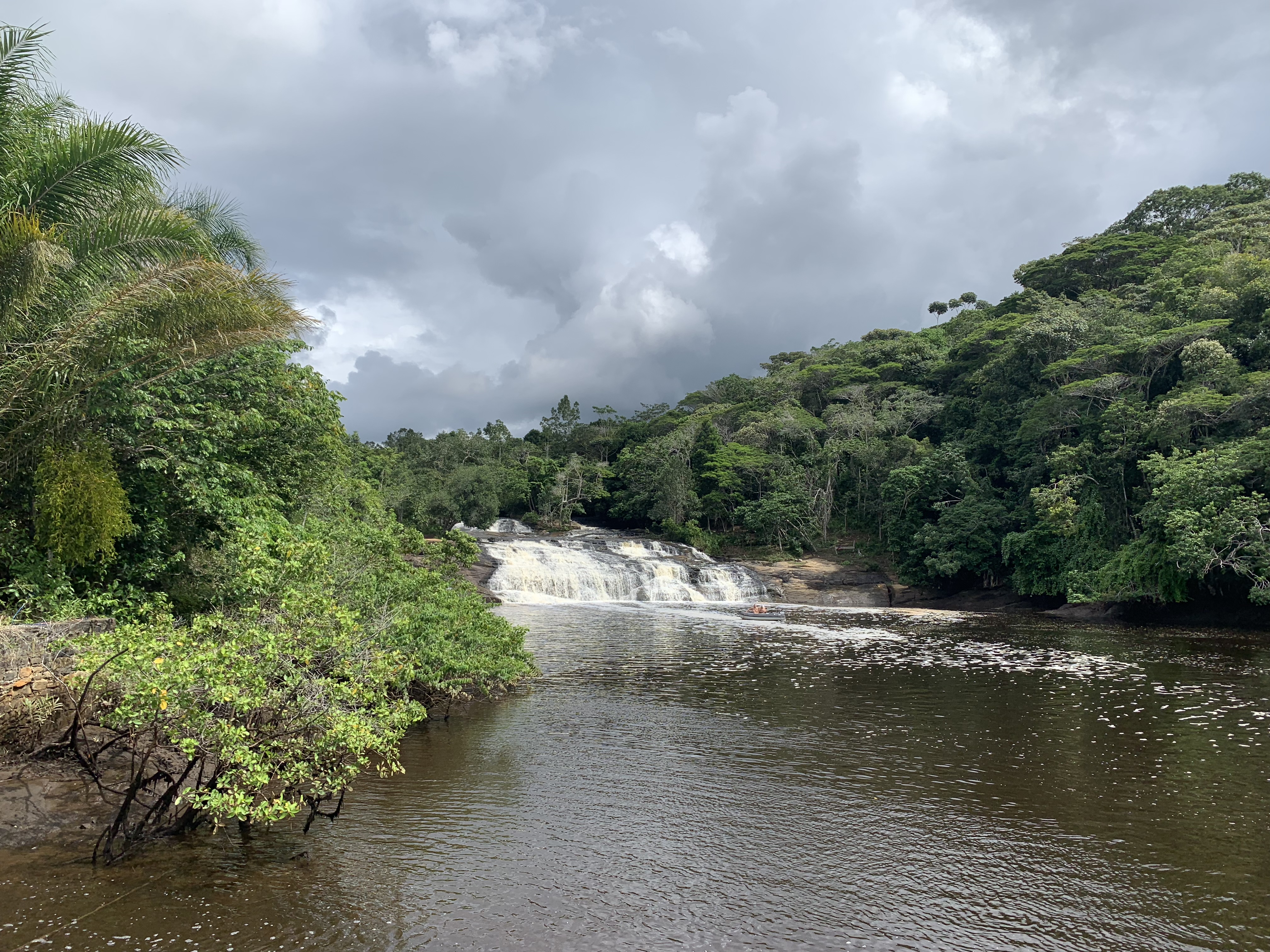 Wide river with waterfall and Atlantic forest, Serra Grande, Bahia