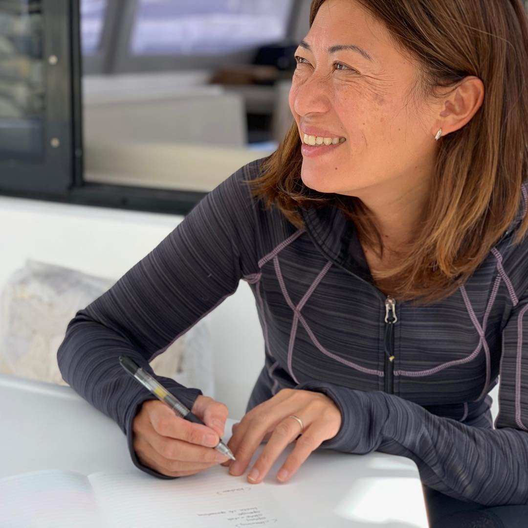Yuka signing the delivery documents — Oroboro is officially ours