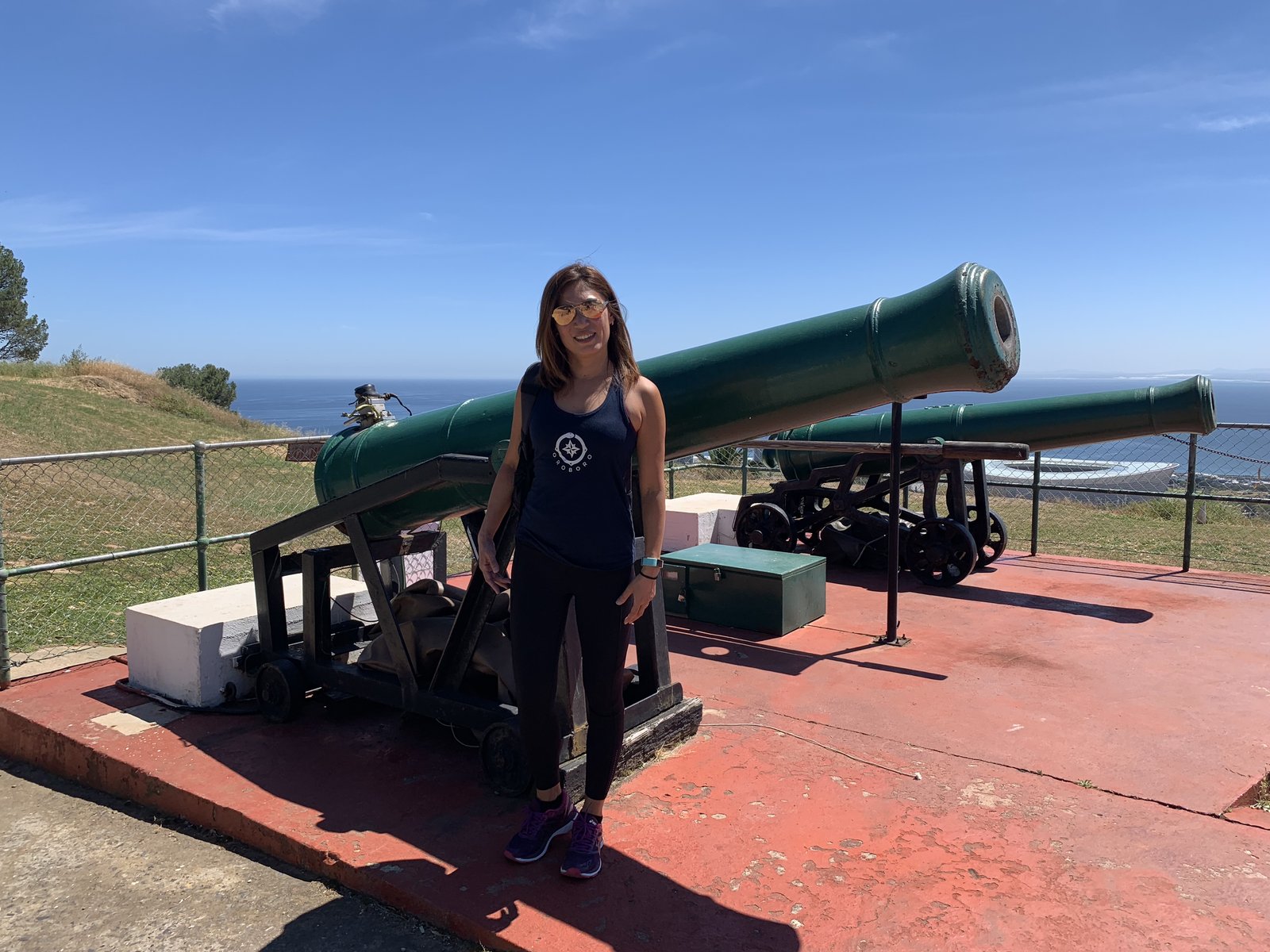 Yuka with the historic Signal Hill cannons overlooking the Atlantic