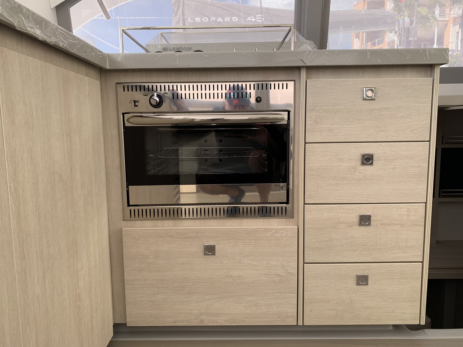 The galley oven cabinet and storage drawers