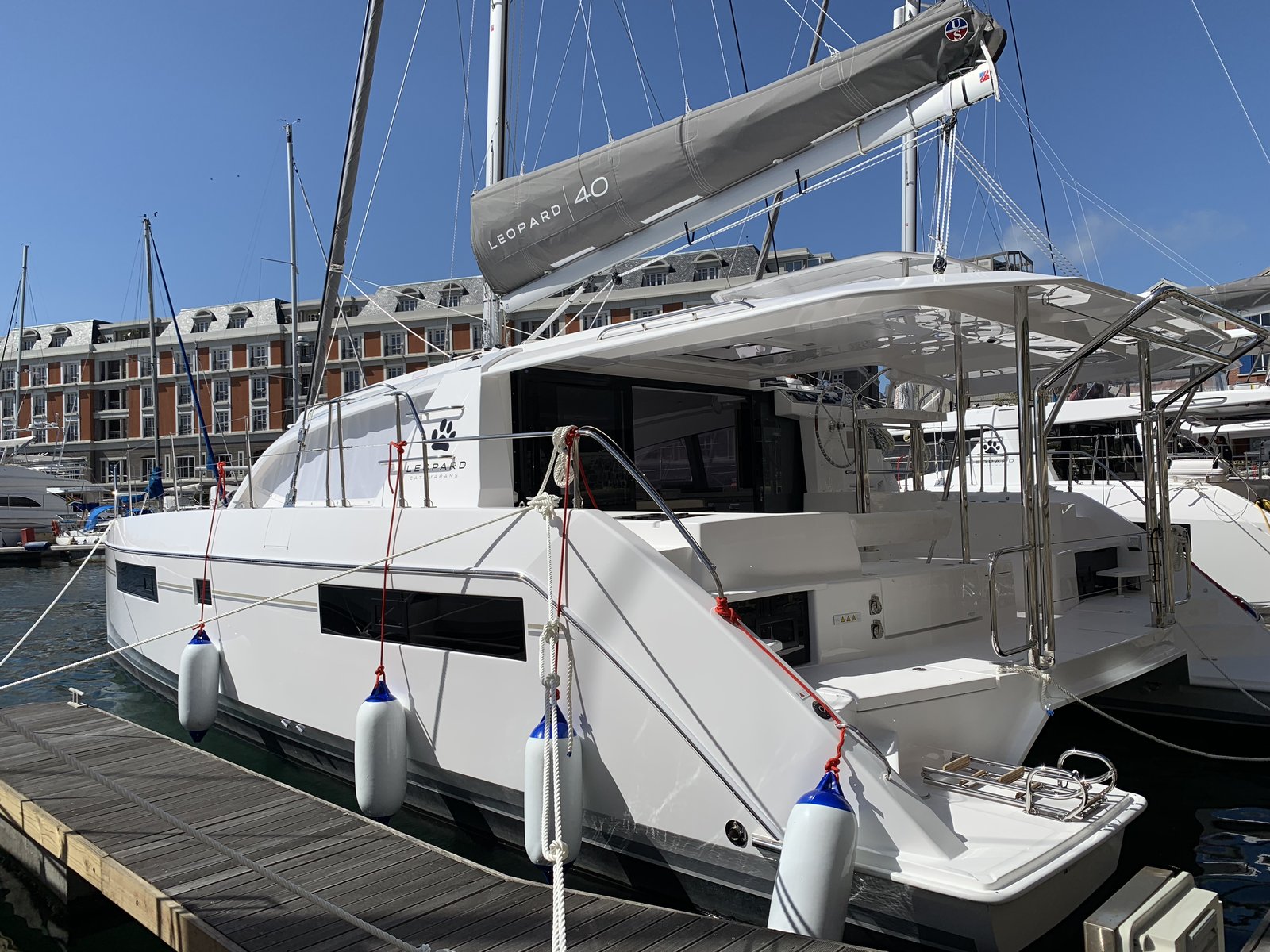 Oroboro alongside at Cape Grace, with the Cape Grace Hotel behind her