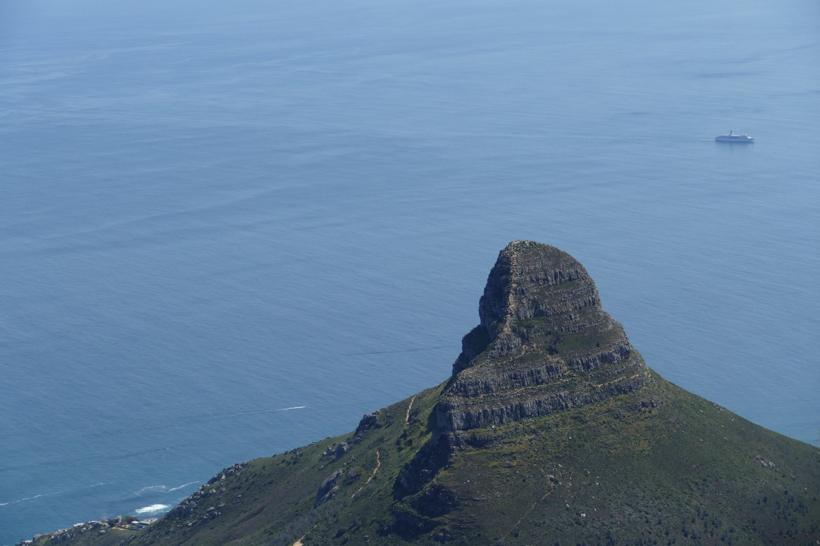 Lion's Head peak viewed from the summit of Table Mountain, with the Atlantic beyond