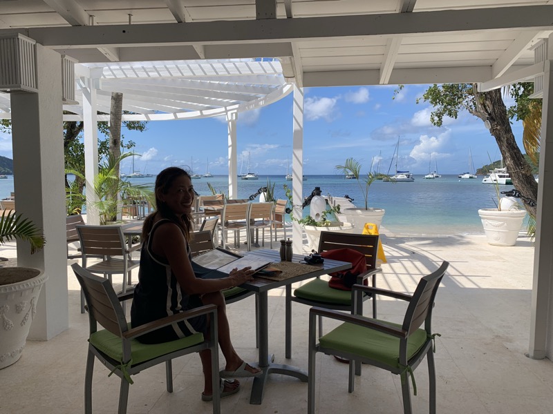 Yuka at a restaurant terrace in Bequia overlooking the anchorage
