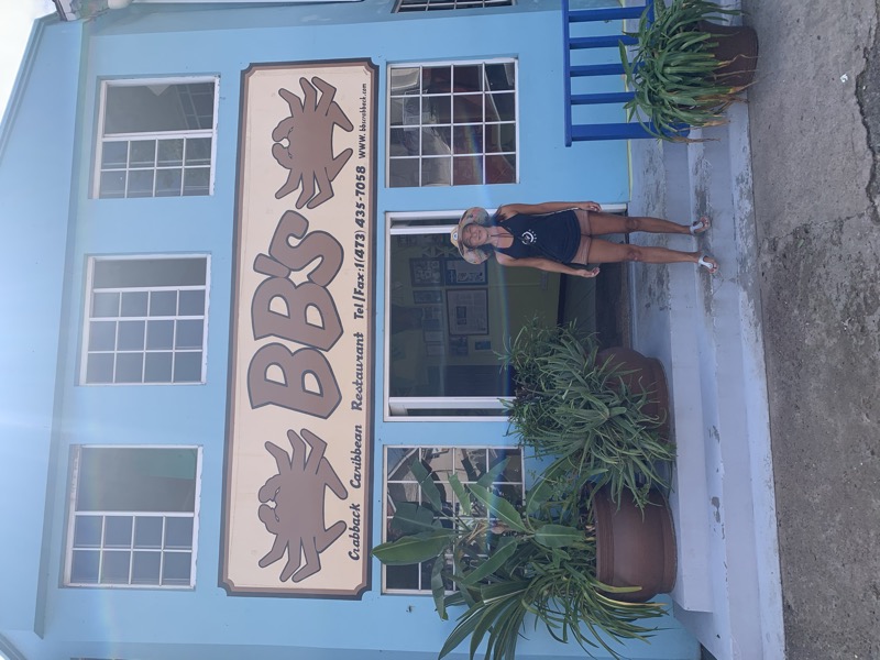 Yuka in front of BB's Crabback Caribbean Restaurant in St. George's, Grenada