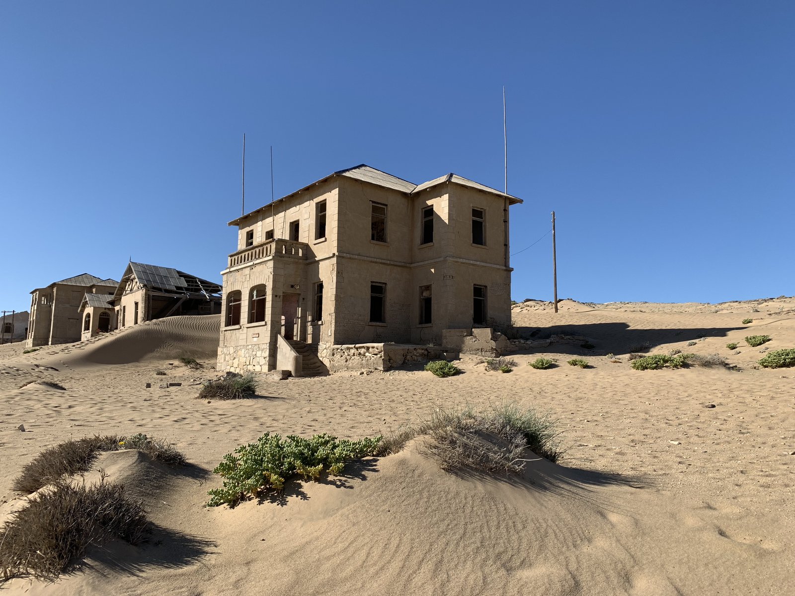 The main hall, half-buried by the encroaching dunes