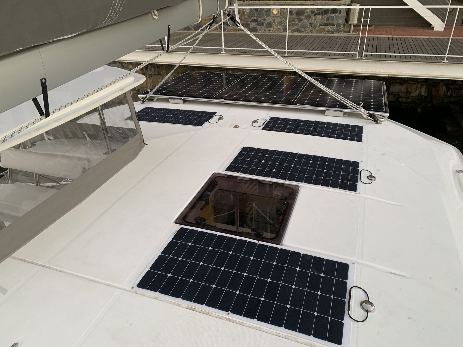 Flexible SunPower solar panels laid across the coachroof