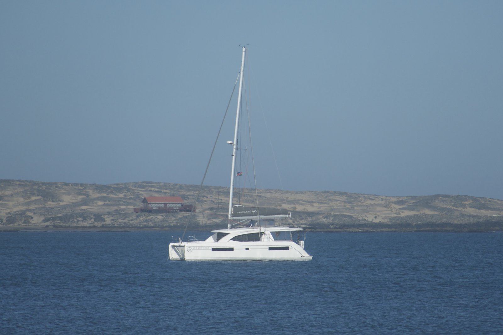Oroboro at anchor at Langebaan — the Saldanha peninsula in the distance