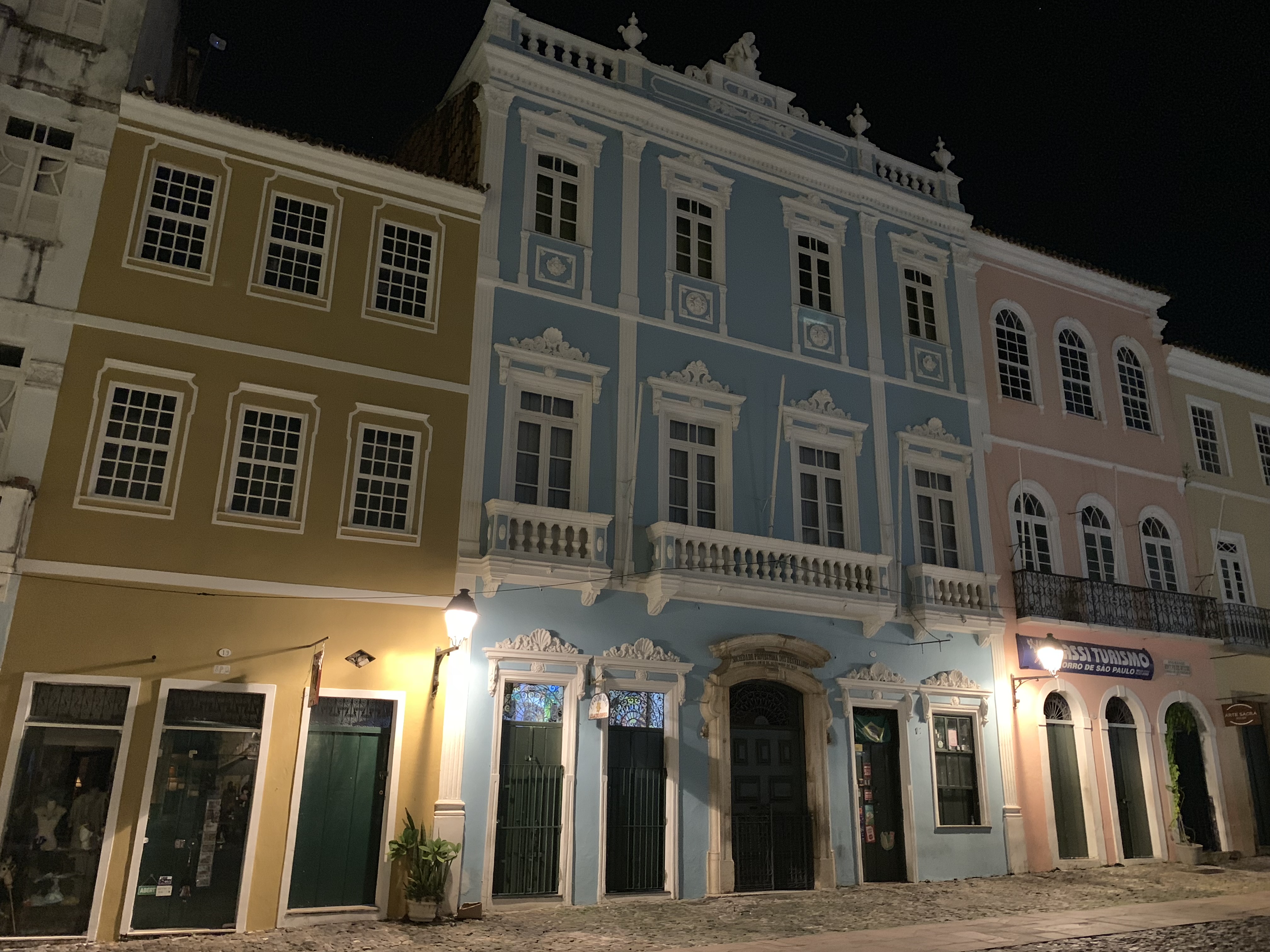 Colorful colonial building facades of Pelourinho lit at night