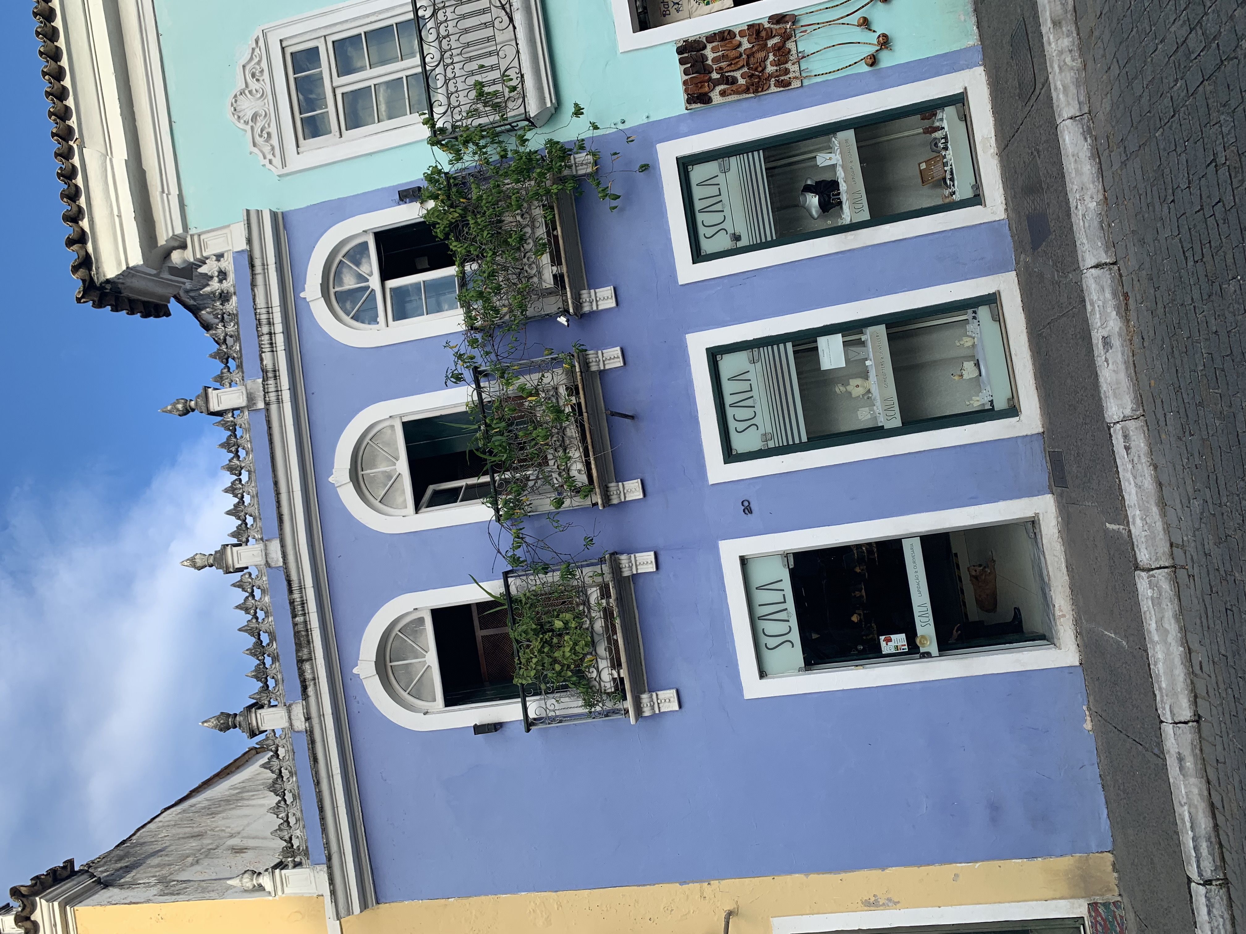 The blue Scena boutique storefront in Pelourinho