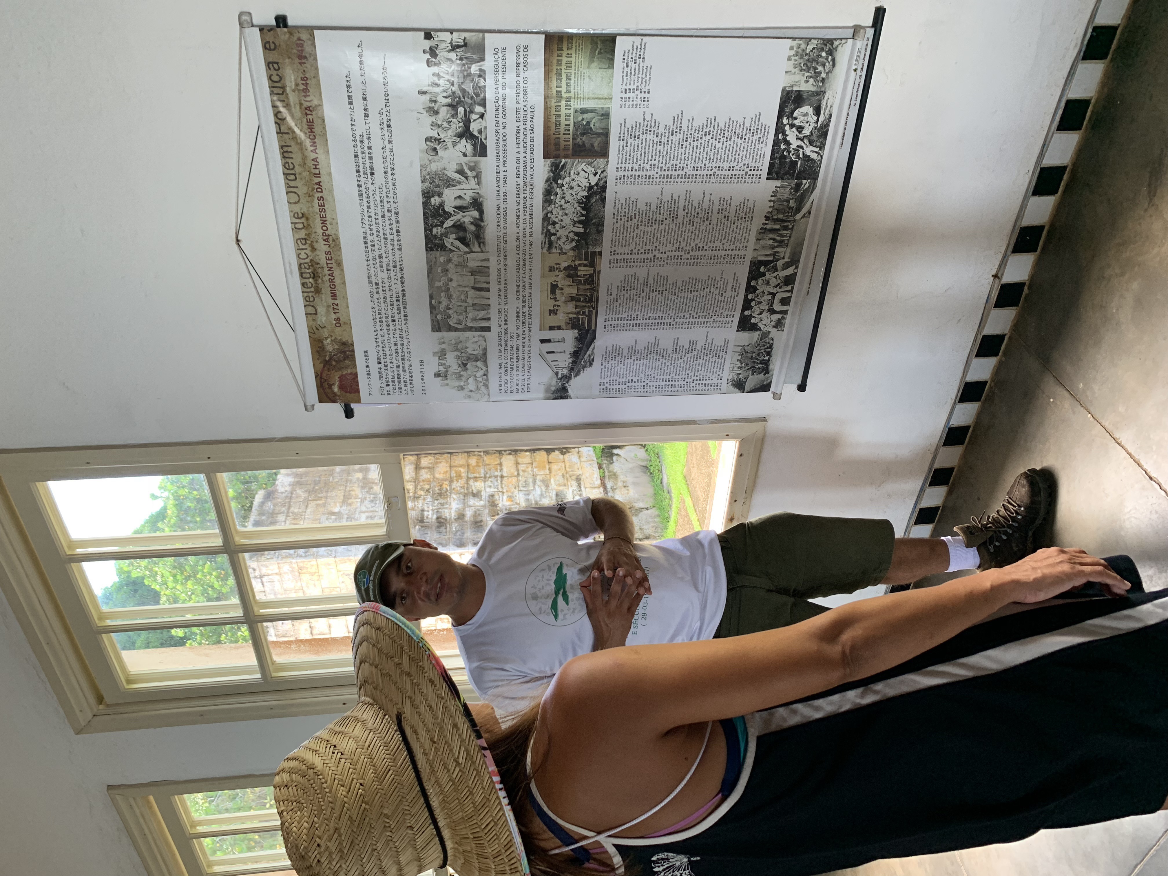 Francesco reading the exhibit about Japanese prisoners at Ilha Anchieta