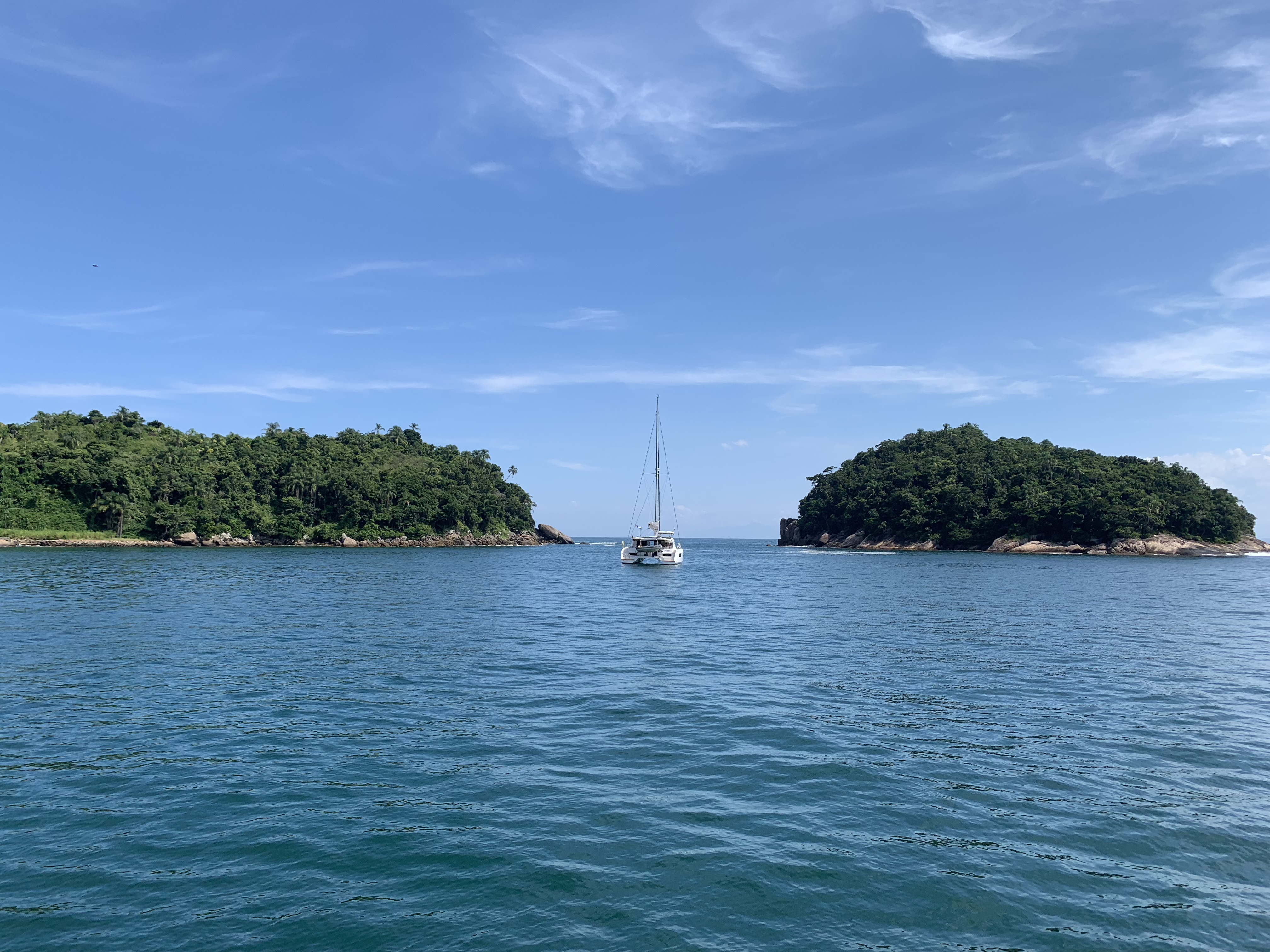 Oroboro anchored between two small islands near Ilhote de Couves